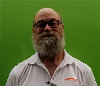 Charlie Dimock SERVPRO Santee Lakeside Owner, male employee in front of green background