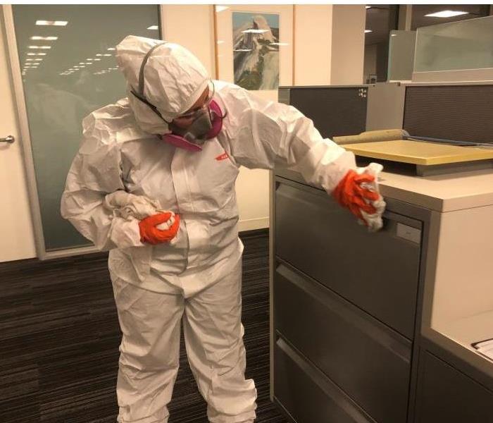 Keeping Clean - technician in PPE
